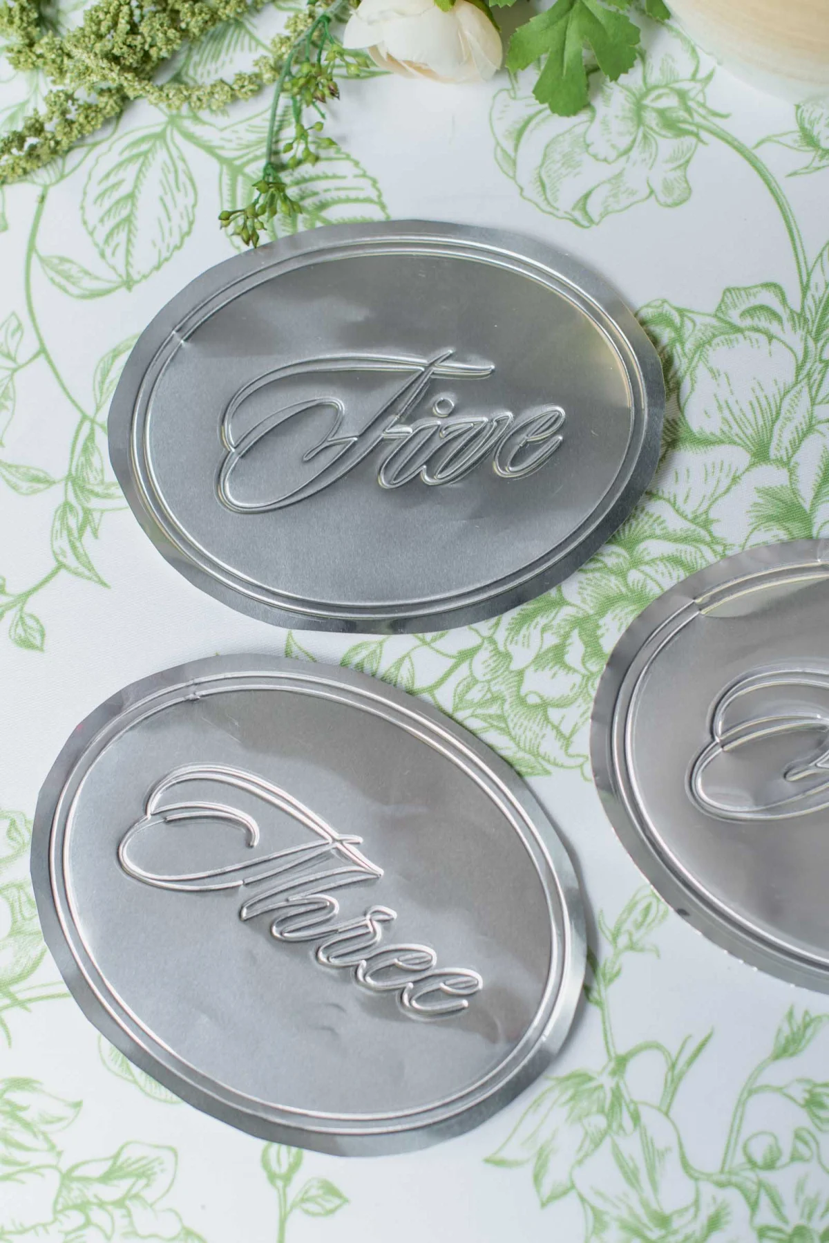 DIY Silver foil metal wedding table numbers made with a Cricut Maker