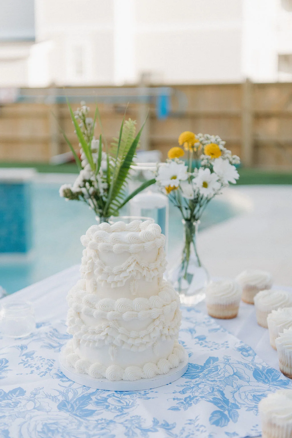 Small vintage Lambeth style two tiered white wedding cake