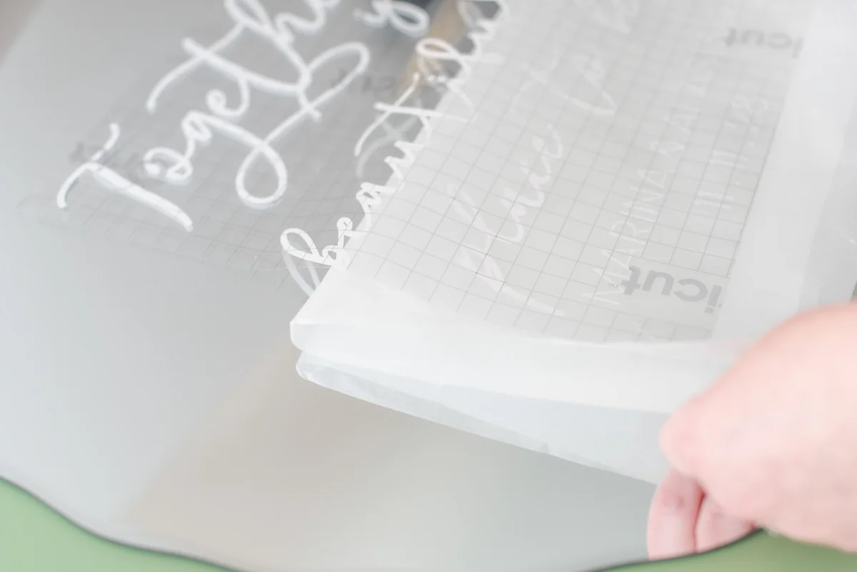 Step by step tutorial on how to transform a mirror into a wedding welcome sign with a Cricut machine