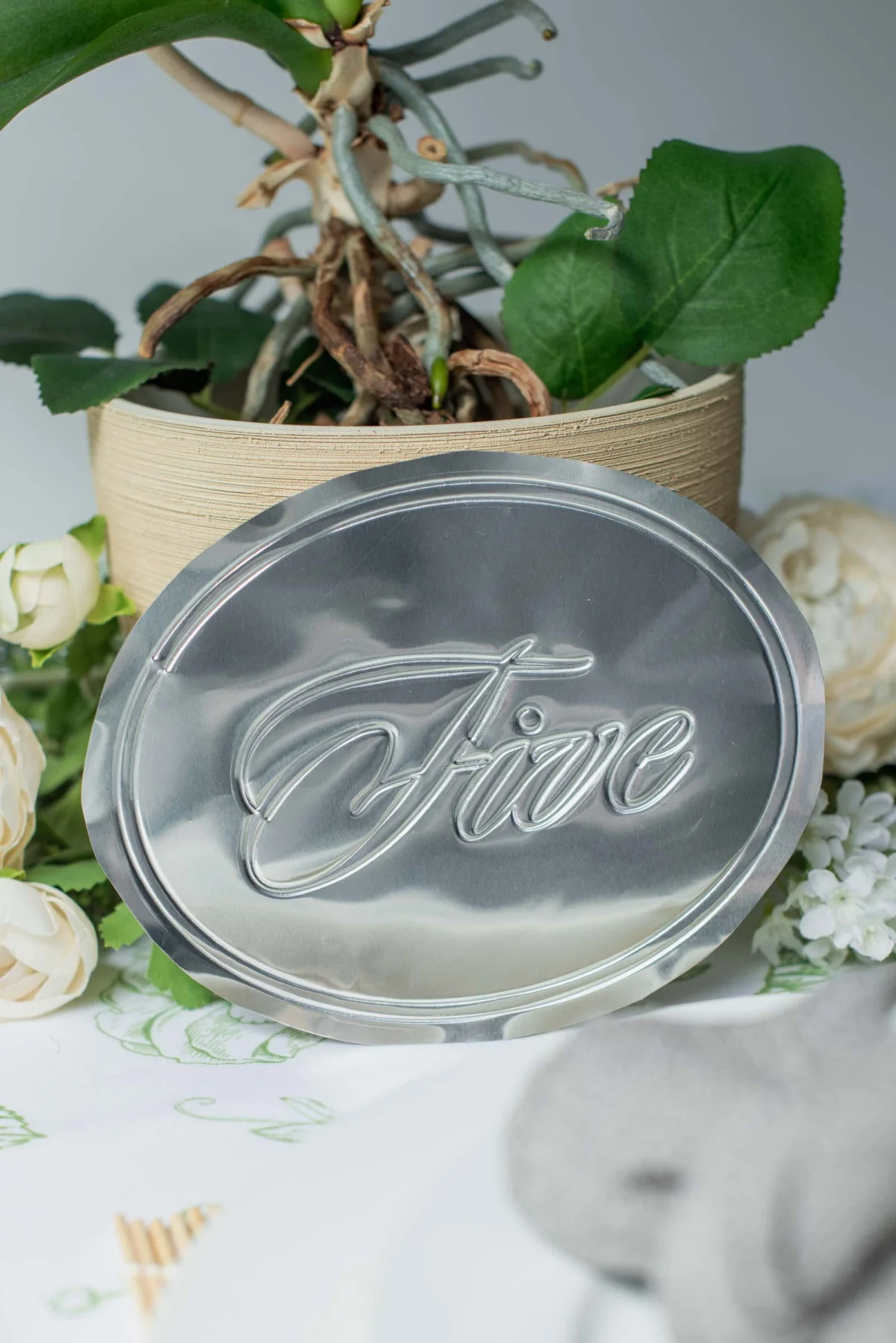 DIY wedding table numbers in silver foil