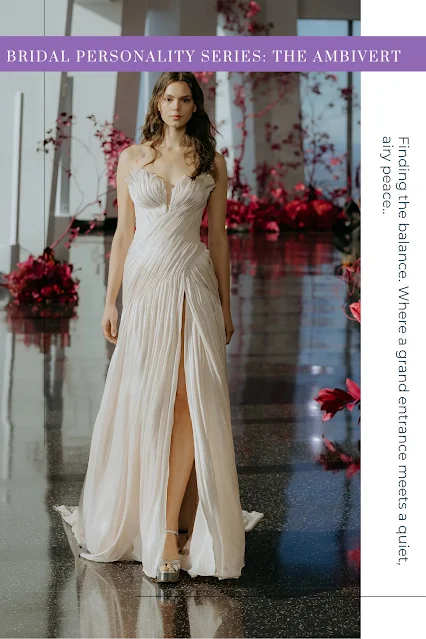 An ivory chiffon organza wedding gown named Kassel by WONÁ Concept, featuring a meticulously draped strapless corset with unique shell-shaped cups and a fluid skirt with a high leg slit.