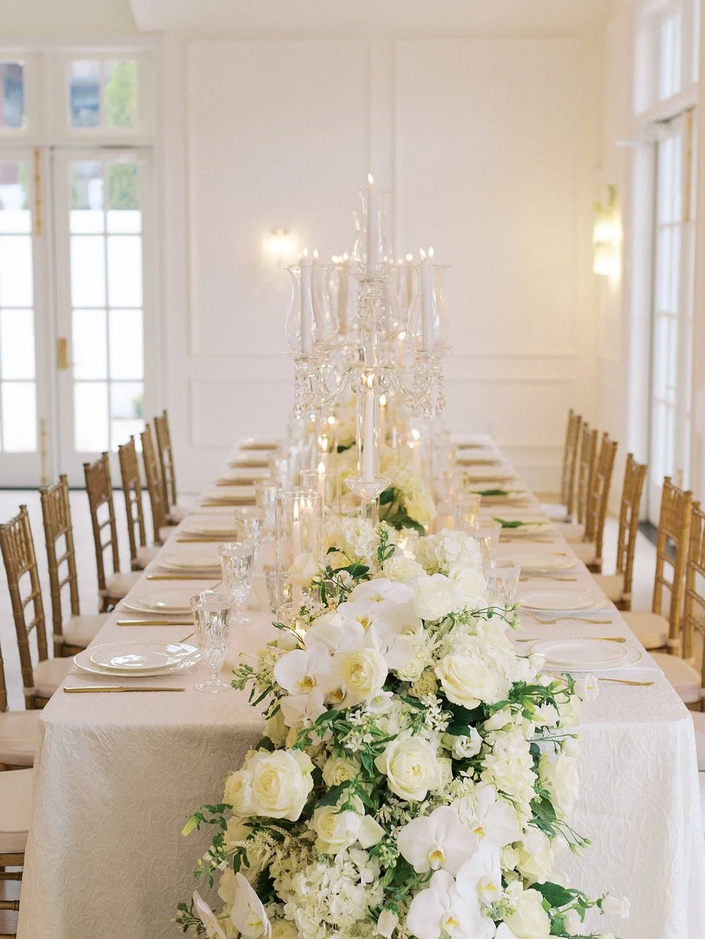 Cake table adorned with floral decor